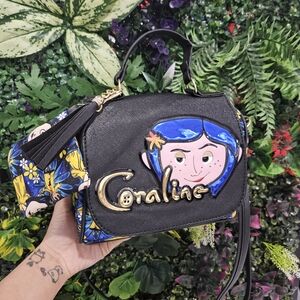 Coraline Black Crossbody Bag with Blue Character Accent